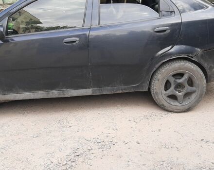 Черный Шевроле Авео, объемом двигателя 1.5 л и пробегом 300 тыс. км за 1100 $, фото 3 на Automoto.ua