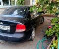 Черный Шевроле Авео, объемом двигателя 1.5 л и пробегом 240 тыс. км за 1300 $, фото 2 на Automoto.ua