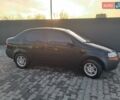 Черный Шевроле Авео, объемом двигателя 1.5 л и пробегом 208 тыс. км за 2300 $, фото 1 на Automoto.ua