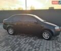 Черный Шевроле Авео, объемом двигателя 1.5 л и пробегом 215 тыс. км за 1800 $, фото 1 на Automoto.ua