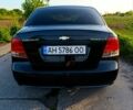 Черный Шевроле Авео, объемом двигателя 1.5 л и пробегом 300 тыс. км за 2600 $, фото 2 на Automoto.ua