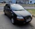 Черный Шевроле Авео, объемом двигателя 1.5 л и пробегом 300 тыс. км за 2300 $, фото 1 на Automoto.ua