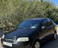 Черный Шевроле Авео, объемом двигателя 1.5 л и пробегом 410 тыс. км за 2500 $, фото 1 на Automoto.ua