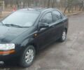 Черный Шевроле Авео, объемом двигателя 1.5 л и пробегом 124 тыс. км за 2800 $, фото 1 на Automoto.ua