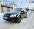 Чорний Шевроле Авео, об'ємом двигуна 1.5 л та пробігом 250 тис. км за 2600 $, фото 1 на Automoto.ua