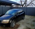 Черный Шевроле Авео, объемом двигателя 1.5 л и пробегом 300 тыс. км за 4000 $, фото 1 на Automoto.ua