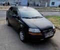 Черный Шевроле Авео, объемом двигателя 1.5 л и пробегом 300 тыс. км за 2250 $, фото 1 на Automoto.ua