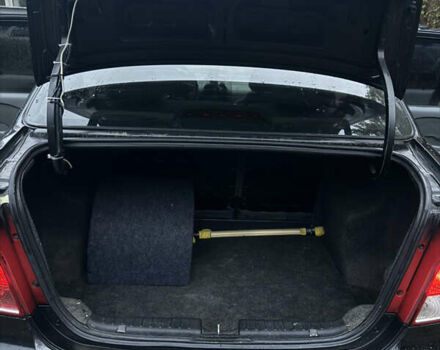 Черный Шевроле Авео, объемом двигателя 1.5 л и пробегом 260 тыс. км за 2950 $, фото 6 на Automoto.ua