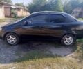 Черный Шевроле Авео, объемом двигателя 1.5 л и пробегом 320 тыс. км за 3200 $, фото 1 на Automoto.ua
