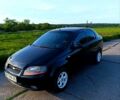 Черный Шевроле Авео, объемом двигателя 1.5 л и пробегом 300 тыс. км за 2600 $, фото 1 на Automoto.ua
