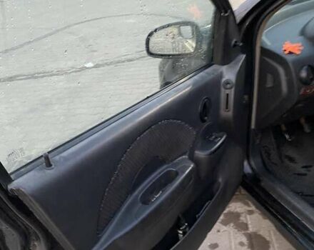 Черный Шевроле Авео, объемом двигателя 1.5 л и пробегом 250 тыс. км за 1650 $, фото 7 на Automoto.ua