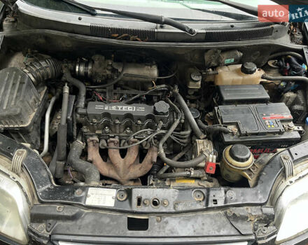 Чорний Шевроле Авео, об'ємом двигуна 1.5 л та пробігом 350 тис. км за 2600 $, фото 12 на Automoto.ua