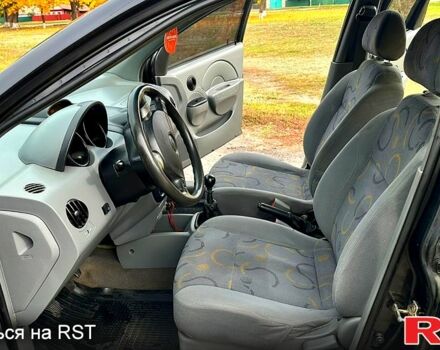 Черный Шевроле Авео, объемом двигателя 1.5 л и пробегом 175 тыс. км за 2600 $, фото 1 на Automoto.ua