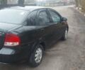 Черный Шевроле Авео, объемом двигателя 1.5 л и пробегом 124 тыс. км за 2800 $, фото 2 на Automoto.ua