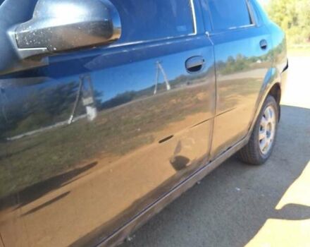 Черный Шевроле Авео, объемом двигателя 1.5 л и пробегом 225 тыс. км за 2300 $, фото 2 на Automoto.ua