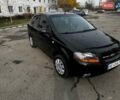 Черный Шевроле Авео, объемом двигателя 1.5 л и пробегом 325 тыс. км за 2650 $, фото 1 на Automoto.ua