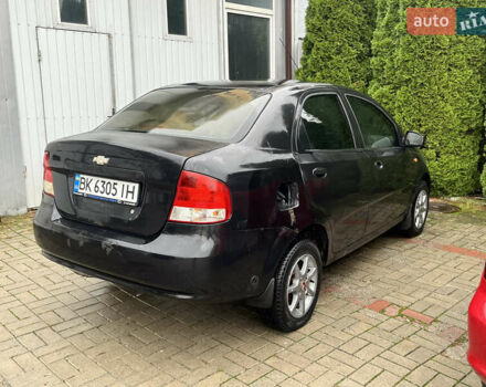 Чорний Шевроле Авео, об'ємом двигуна 1.5 л та пробігом 350 тис. км за 2600 $, фото 4 на Automoto.ua