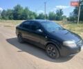 Черный Шевроле Авео, объемом двигателя 1.5 л и пробегом 300 тыс. км за 2499 $, фото 1 на Automoto.ua