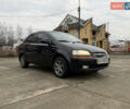 Чорний Шевроле Авео, об'ємом двигуна 1.5 л та пробігом 154 тис. км за 2000 $, фото 1 на Automoto.ua