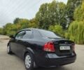 Черный Шевроле Авео, объемом двигателя 1.5 л и пробегом 230 тыс. км за 2950 $, фото 2 на Automoto.ua