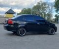 Черный Шевроле Авео, объемом двигателя 1.5 л и пробегом 231 тыс. км за 3999 $, фото 5 на Automoto.ua