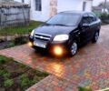 Черный Шевроле Авео, объемом двигателя 1.5 л и пробегом 214 тыс. км за 2600 $, фото 1 на Automoto.ua