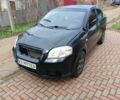 Черный Шевроле Авео, объемом двигателя 1.5 л и пробегом 230 тыс. км за 1650 $, фото 1 на Automoto.ua