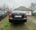 Черный Шевроле Авео, объемом двигателя 1.5 л и пробегом 253 тыс. км за 3900 $, фото 1 на Automoto.ua