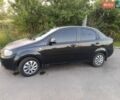 Черный Шевроле Авео, объемом двигателя 1.5 л и пробегом 225 тыс. км за 3000 $, фото 1 на Automoto.ua