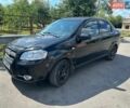 Черный Шевроле Авео, объемом двигателя 1.5 л и пробегом 370 тыс. км за 2350 $, фото 1 на Automoto.ua