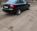 Черный Шевроле Авео, объемом двигателя 1.5 л и пробегом 220 тыс. км за 3500 $, фото 2 на Automoto.ua