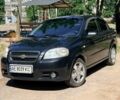 Черный Шевроле Авео, объемом двигателя 1.5 л и пробегом 185 тыс. км за 4000 $, фото 1 на Automoto.ua