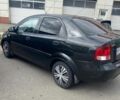 Чорний Шевроле Авео, об'ємом двигуна 1.5 л та пробігом 141 тис. км за 3200 $, фото 1 на Automoto.ua