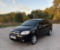 Черный Шевроле Авео, объемом двигателя 1.4 л и пробегом 176 тыс. км за 4413 $, фото 1 на Automoto.ua