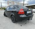 Черный Шевроле Авео, объемом двигателя 1.5 л и пробегом 217 тыс. км за 3200 $, фото 1 на Automoto.ua