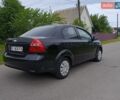 Черный Шевроле Авео, объемом двигателя 1.5 л и пробегом 298 тыс. км за 2800 $, фото 1 на Automoto.ua
