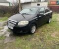Черный Шевроле Авео, объемом двигателя 1.5 л и пробегом 253 тыс. км за 3900 $, фото 1 на Automoto.ua