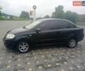 Черный Шевроле Авео, объемом двигателя 1.5 л и пробегом 241 тыс. км за 2850 $, фото 1 на Automoto.ua