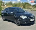 Черный Шевроле Авео, объемом двигателя 1.5 л и пробегом 290 тыс. км за 2800 $, фото 1 на Automoto.ua