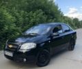 Черный Шевроле Авео, объемом двигателя 1.5 л и пробегом 230 тыс. км за 2550 $, фото 1 на Automoto.ua