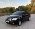 Черный Шевроле Авео, объемом двигателя 1.4 л и пробегом 176 тыс. км за 4400 $, фото 1 на Automoto.ua