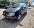 Черный Шевроле Авео, объемом двигателя 1.5 л и пробегом 200 тыс. км за 1950 $, фото 1 на Automoto.ua