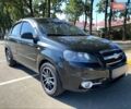 Черный Шевроле Авео, объемом двигателя 1.5 л и пробегом 303 тыс. км за 4750 $, фото 1 на Automoto.ua