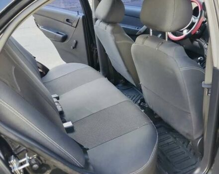 Чорний Шевроле Авео, об'ємом двигуна 1.5 л та пробігом 159 тис. км за 5785 $, фото 2 на Automoto.ua