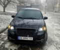 Черный Шевроле Авео, объемом двигателя 1.5 л и пробегом 270 тыс. км за 2350 $, фото 1 на Automoto.ua