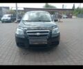 Черный Шевроле Авео, объемом двигателя 1.5 л и пробегом 205 тыс. км за 4395 $, фото 1 на Automoto.ua
