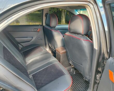 Черный Шевроле Авео, объемом двигателя 1.5 л и пробегом 235 тыс. км за 4500 $, фото 4 на Automoto.ua