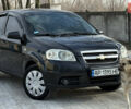 Черный Шевроле Авео, объемом двигателя 1.5 л и пробегом 202 тыс. км за 3550 $, фото 1 на Automoto.ua