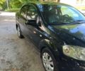 Чорний Шевроле Авео, об'ємом двигуна 1.5 л та пробігом 357 тис. км за 3600 $, фото 1 на Automoto.ua