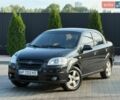 Черный Шевроле Авео, объемом двигателя 1.4 л и пробегом 200 тыс. км за 4700 $, фото 1 на Automoto.ua